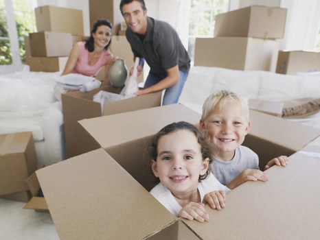 Students moving boxes during a Twickenham removals service