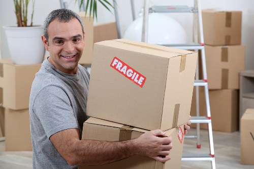 Removal team preparing items for a UK home move