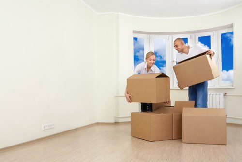 Mover assessing cubic-yard load size for a local removal quote