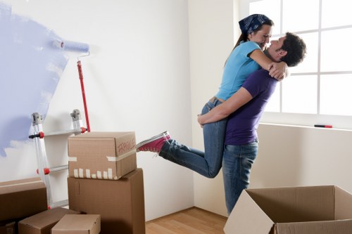 Professional movers handling heavy furniture safely