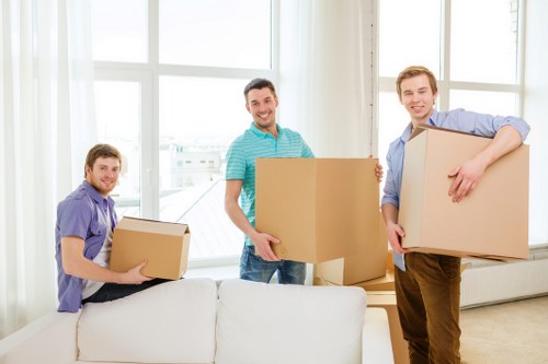 Professional movers loading furniture for a Twickenham move