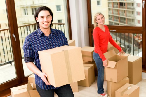 Organized storage space in Twickenham with boxes and furniture