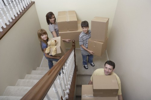 Professional movers packing household items for a Twickenham move